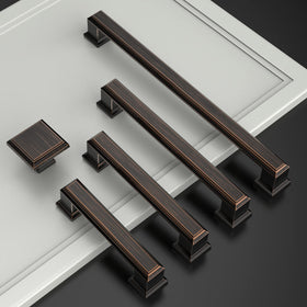 Amerdeco 5-inch hole centers pulls installed on a modern white cabinet.