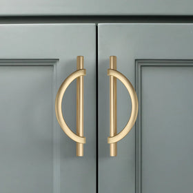Amerdeco brushed gold cabinet pulls with 128mm center-to-center spacing.