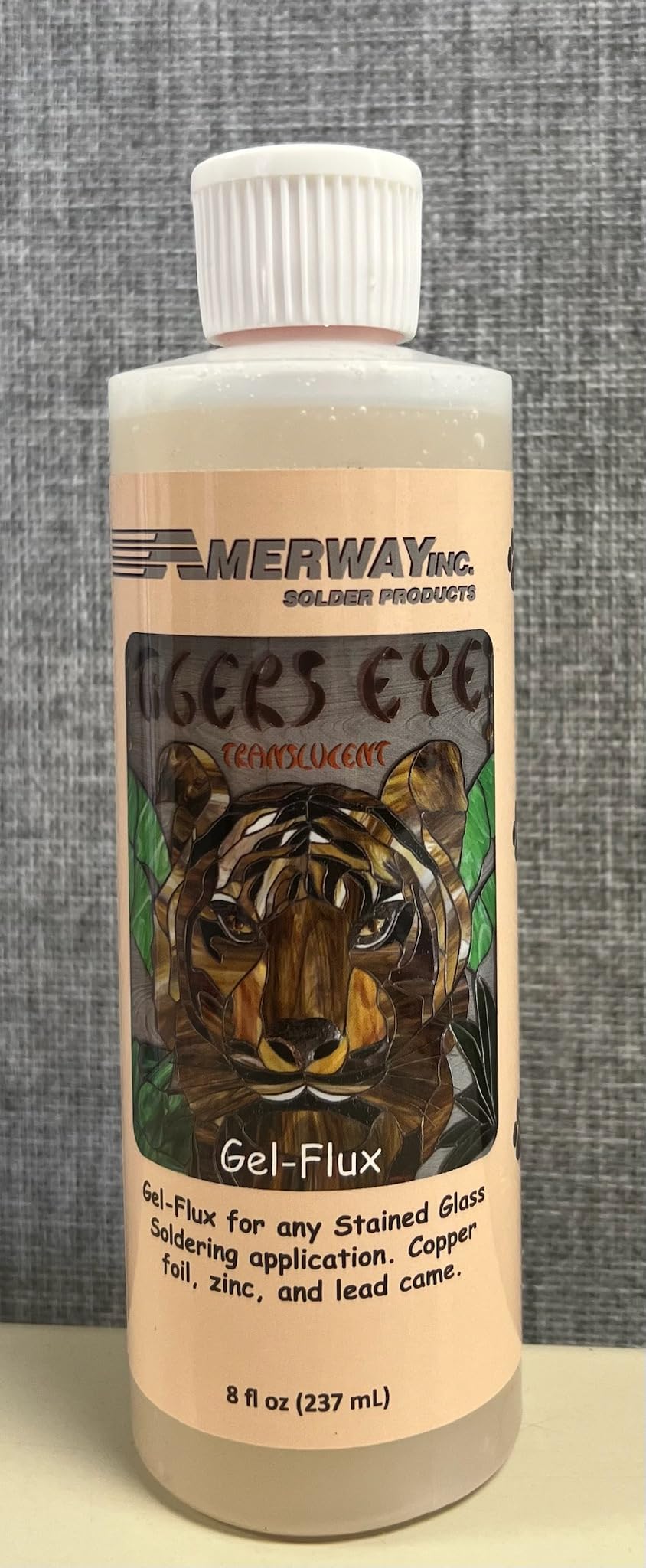 Amerway Tigers Eye translucent gel flux bottle close-up for stained glass soldering