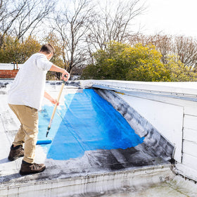 AMES Blue Max seals cracks on wall for durable basement protection.