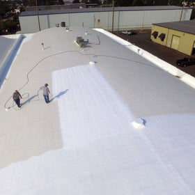 AMES Maximum-Stretch coating on metal roof showing strong adhesion and flexibility.