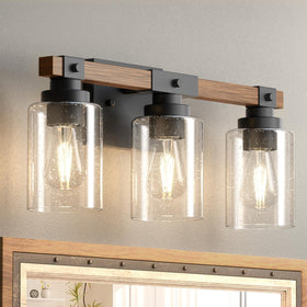 Amico 3-light vanity with wood finish creates rustic bathroom focal point.