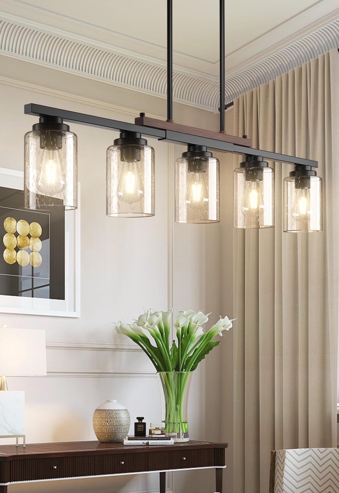 Amico seeded glass shade diffuses soft light over dining surfaces