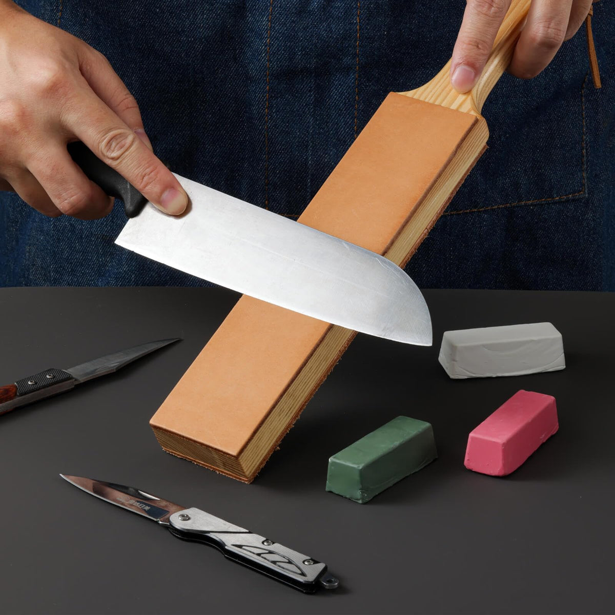 Angerstone white stropping compound for fine honing and edge refinement.