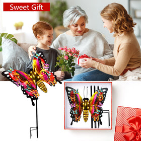 ANGMLN 41-inch butterfly garden ornament stands tall in flower beds.