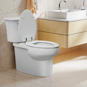 Angol Shiold seat with high-gloss enamel finish adds timeless bathroom elegance.