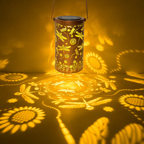 ANYTALK Dragonfly Flower lantern on a pergola creates mesmerizing shadows