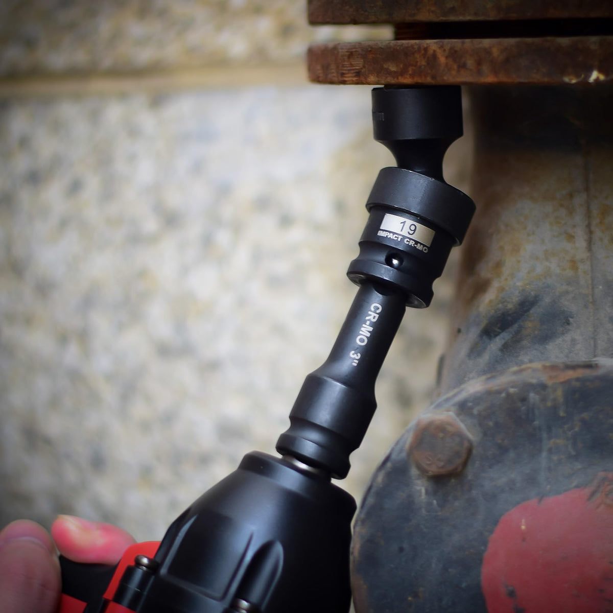 AOBEN 18-pc set in use on a stubborn bolt.