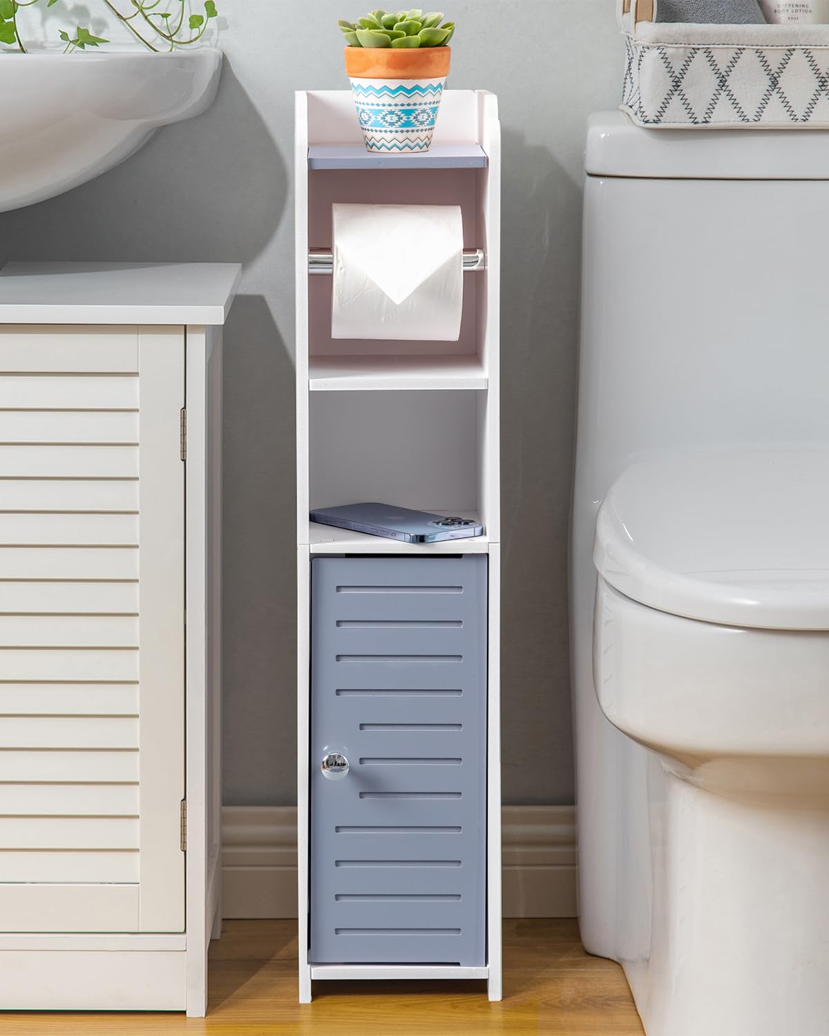 AOJEZOR toilet paper holder stand light grey shows built-in roll storage for compact bathrooms.