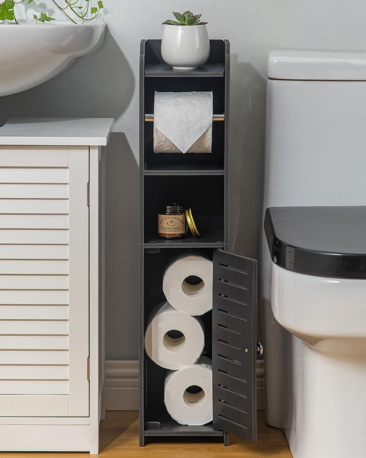 AOJEZOR toilet paper stand multi-tier storage holds four mega rolls.