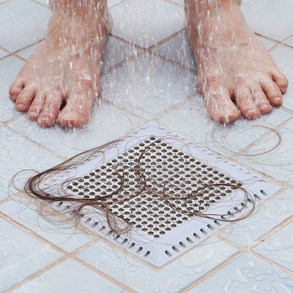 Aojuxix patented shower drain catcher on a bathroom floor drain for enhanced drainage