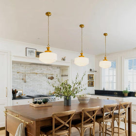 Aomuo pleated white glass drum shade provides soft, even illumination