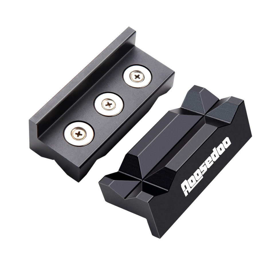 AOOOSEDOO 4-inch aluminum vise jaw pad on a bench vise protecting aluminum fittings from scratches.