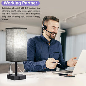 Aooshine lamp with USB-C, USB-A, and AC outlet for charging.