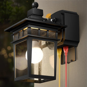 APOTO Dusk-to-Dawn outdoor light with GFCI outlet for safer outdoor setup.