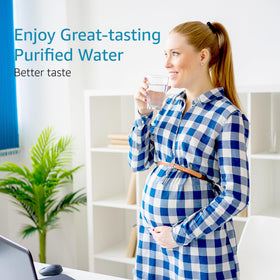 Aqua Crest CF10A fresh filtered water in glass.