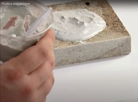 Aqua Mix Poultice Stain Remover applying on stone reveals deep-set oil stains without scrubbing.