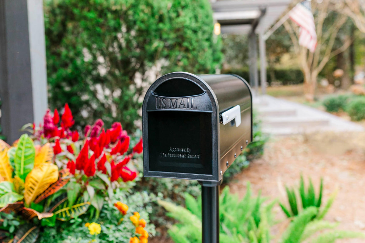 Architectural Mailboxes Carlisle postmount mailbox, USPS approved badge for reliable deliveries.