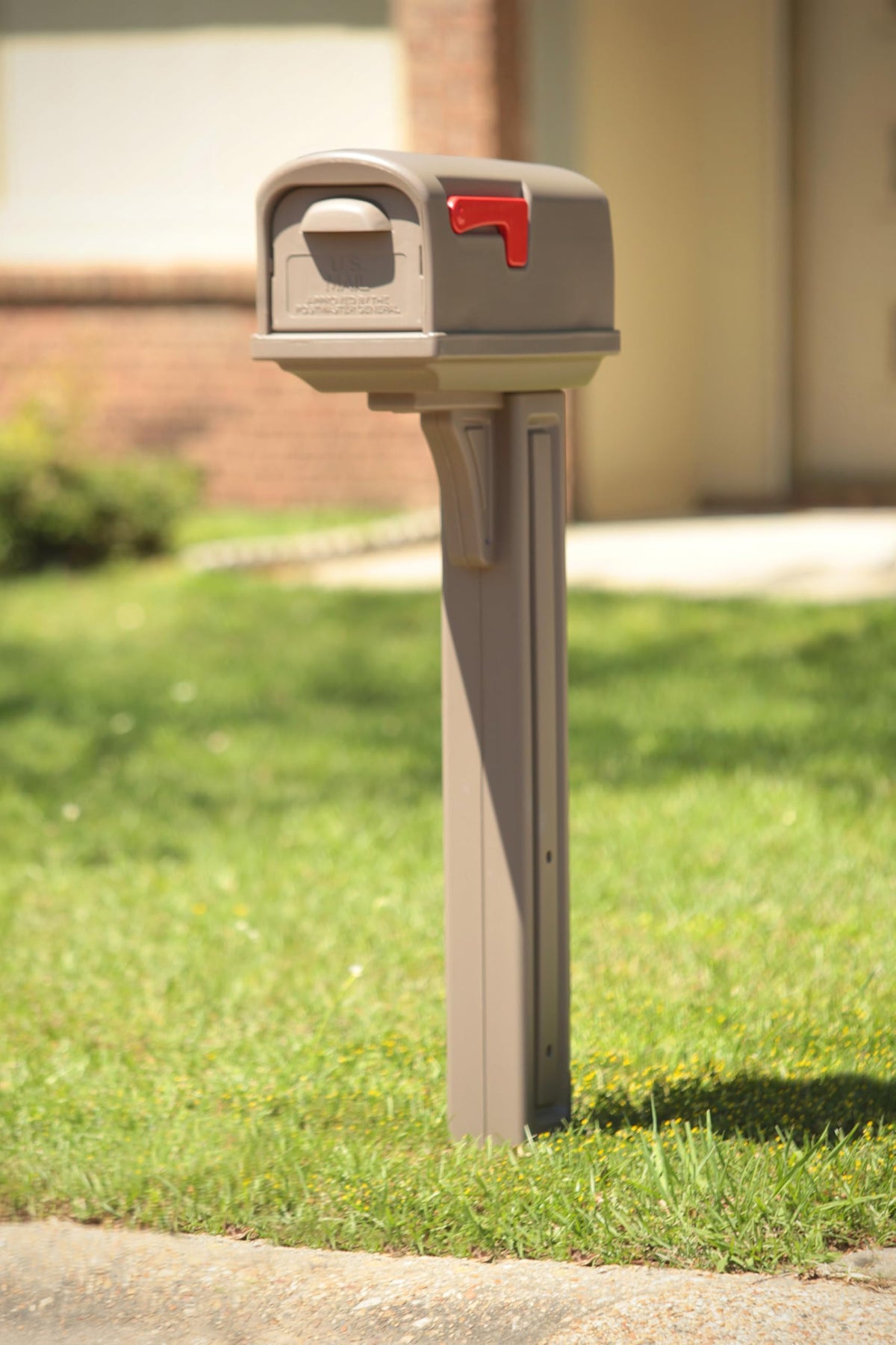 Architectural Mailboxes Classic mailbox with post offers dual access doors for convenience