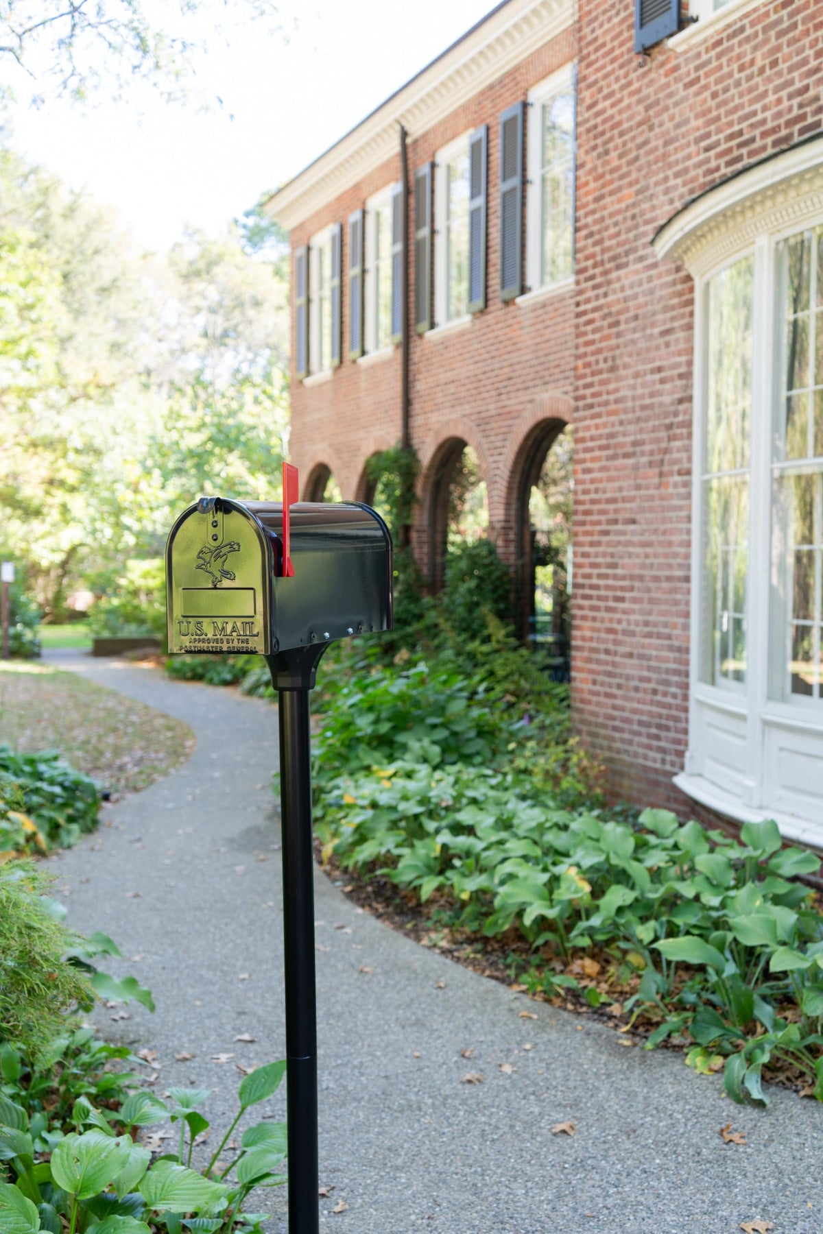 Architectural Mailboxes Coolidge weather-ready post withstands rain and sun for dependable performance.