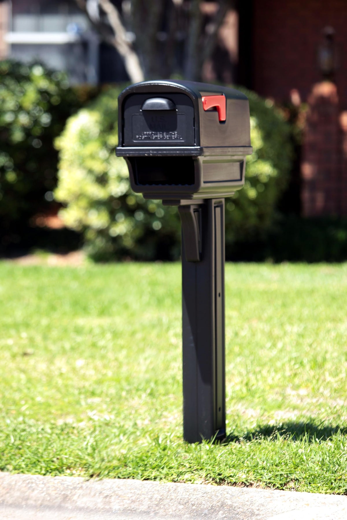 ARCHITECTURAL MAILBOXES Gentry rear-door access emphasizes safe mail retrieval.