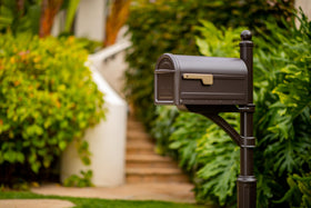 ARCHITECTURAL MAILBOXES Mapleton magnetic latch close demonstrates secure, wind-resistant closure.