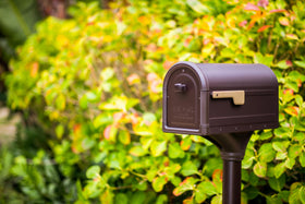 ARCHITECTURAL MAILBOXES Roxbury post mount assembly shows sturdy galvanized steel construction.