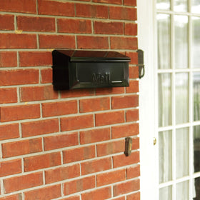 ARCHITECTURAL MAILBOXES Townhouse side view shows wall-mount and sturdy build
