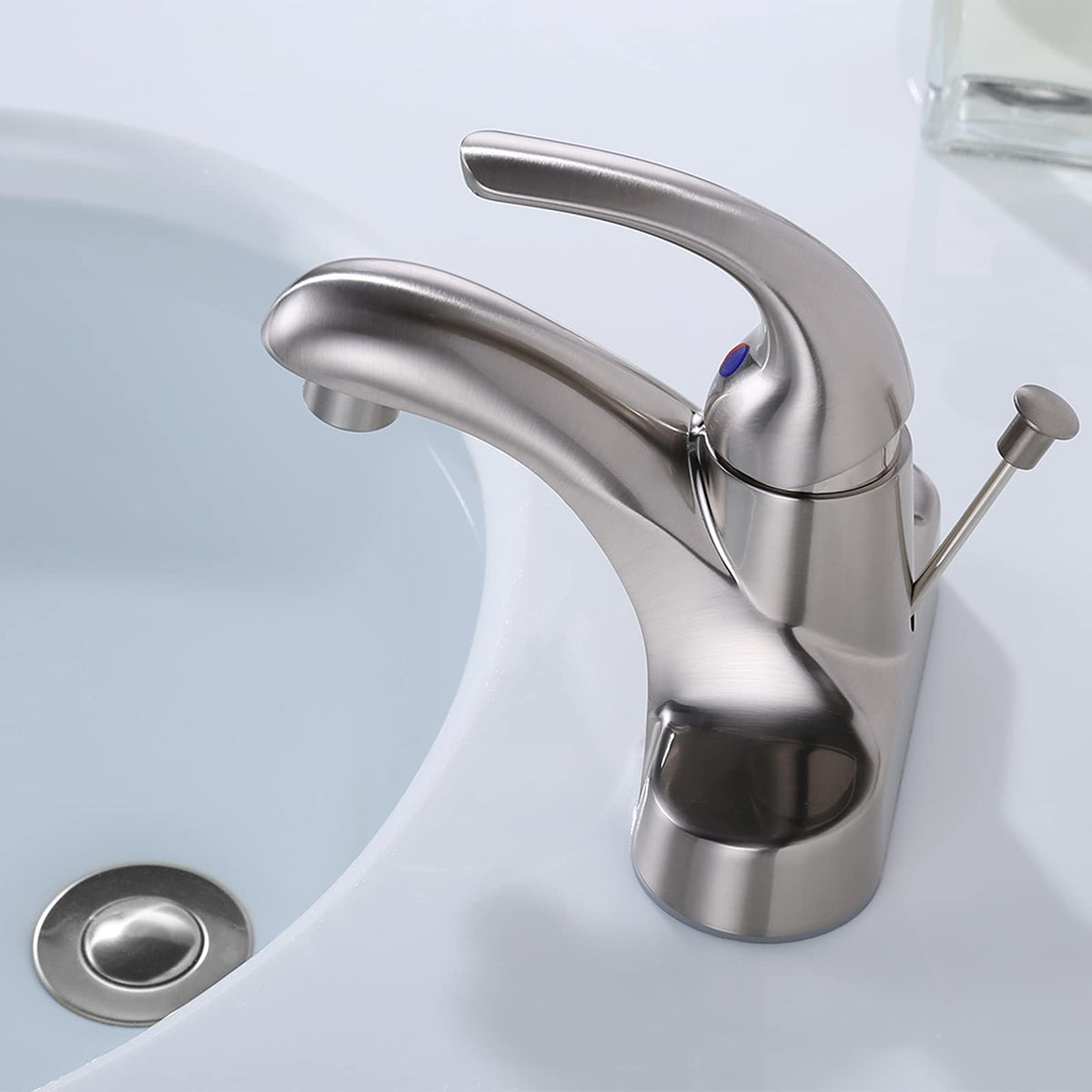 ARCORA overflow sink drain in brushed nickel for clean, contained water drainage