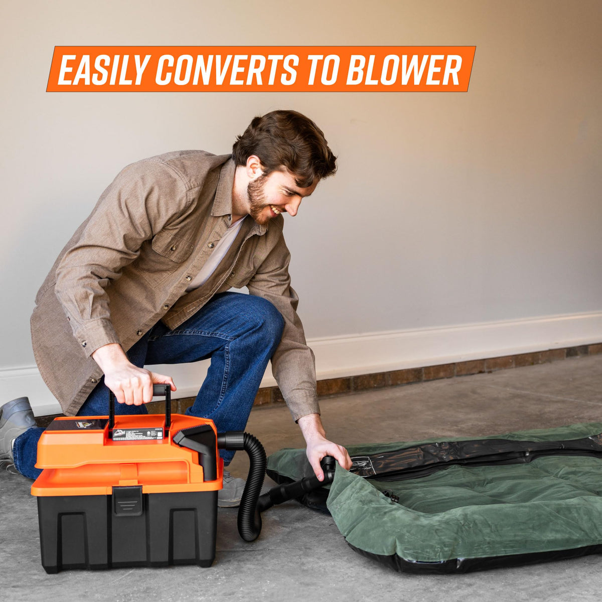 Armor All 2.5-Gallon cordless vac tackling a liquid spill