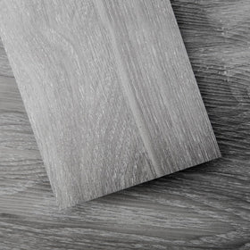 Art3d Peel and Stick Floor Tile with light grey wood grain finish.