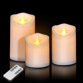 Artmarry flameless 4-inch pillar candle glowing warmly for patios and living rooms