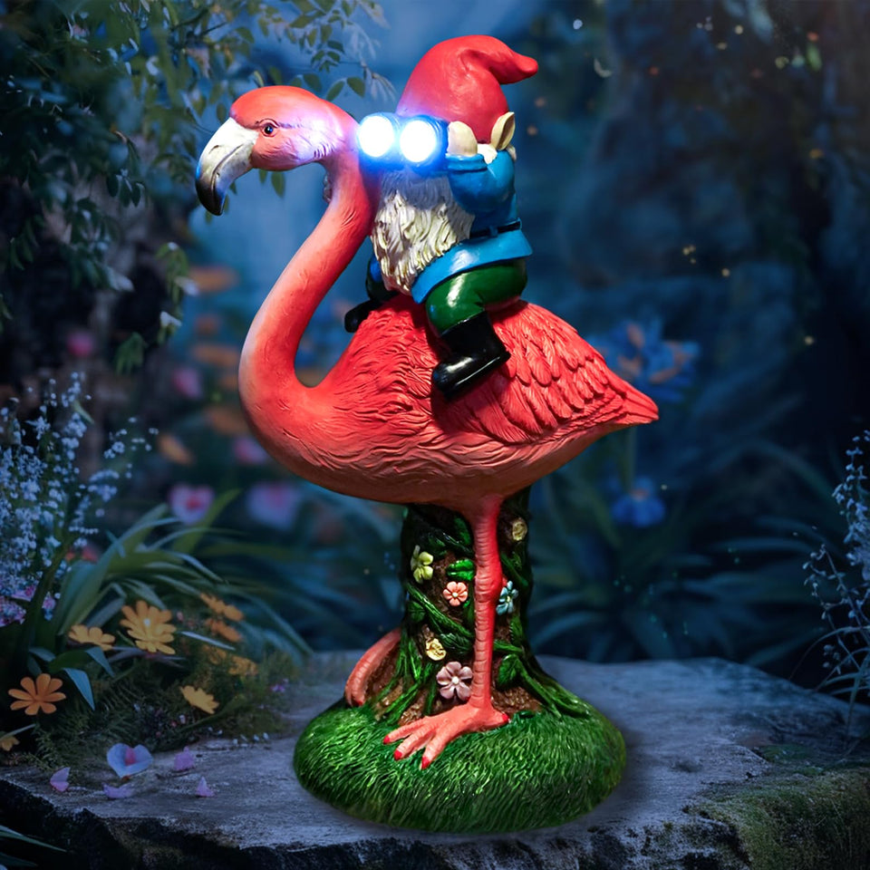 ArtTerpnica solar flamingo gnome backyard lit at dusk, adding playful charm to your garden.