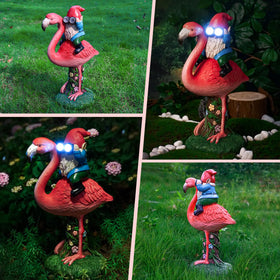 ArtTerpnica solar flamingo gnome telescope glow lights up the night garden.