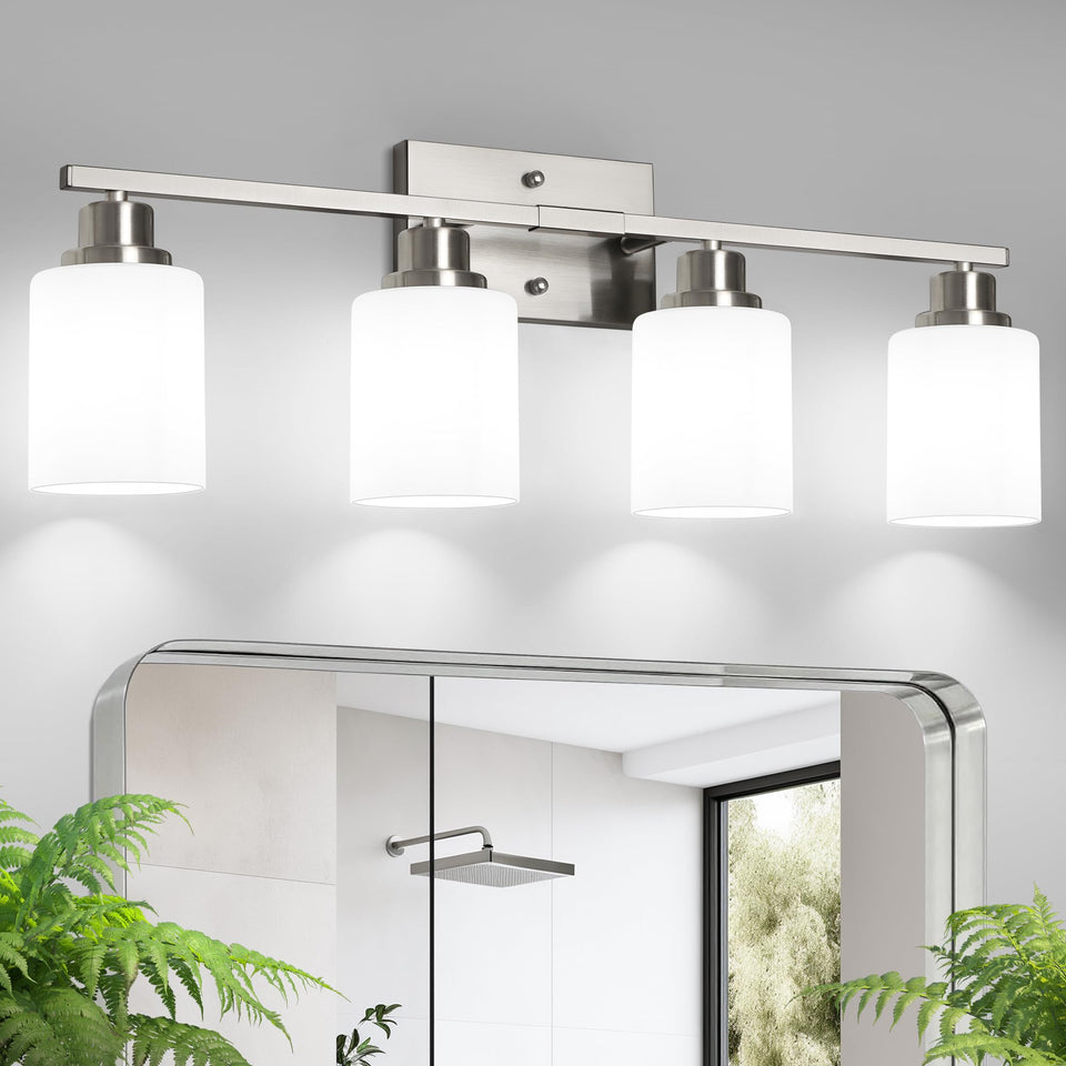 Ascher 4-light vanity over mirror evenly brightens bathrooms