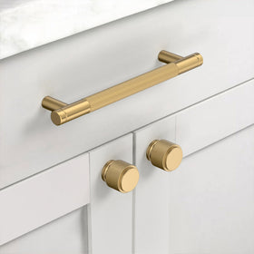 Asidrama knurled drawer pull in champagne bronze enhances accessibility and style.