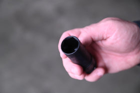 Astro Tool 78204 21.5mm thin-wall socket fits swollen lug nuts.