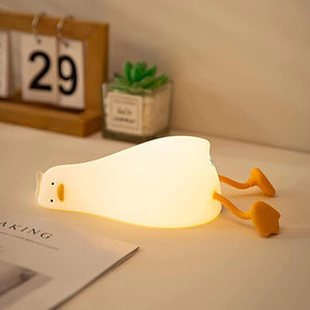 ATCTBOGFS duck night light on bedside table provides warm, cozy illumination