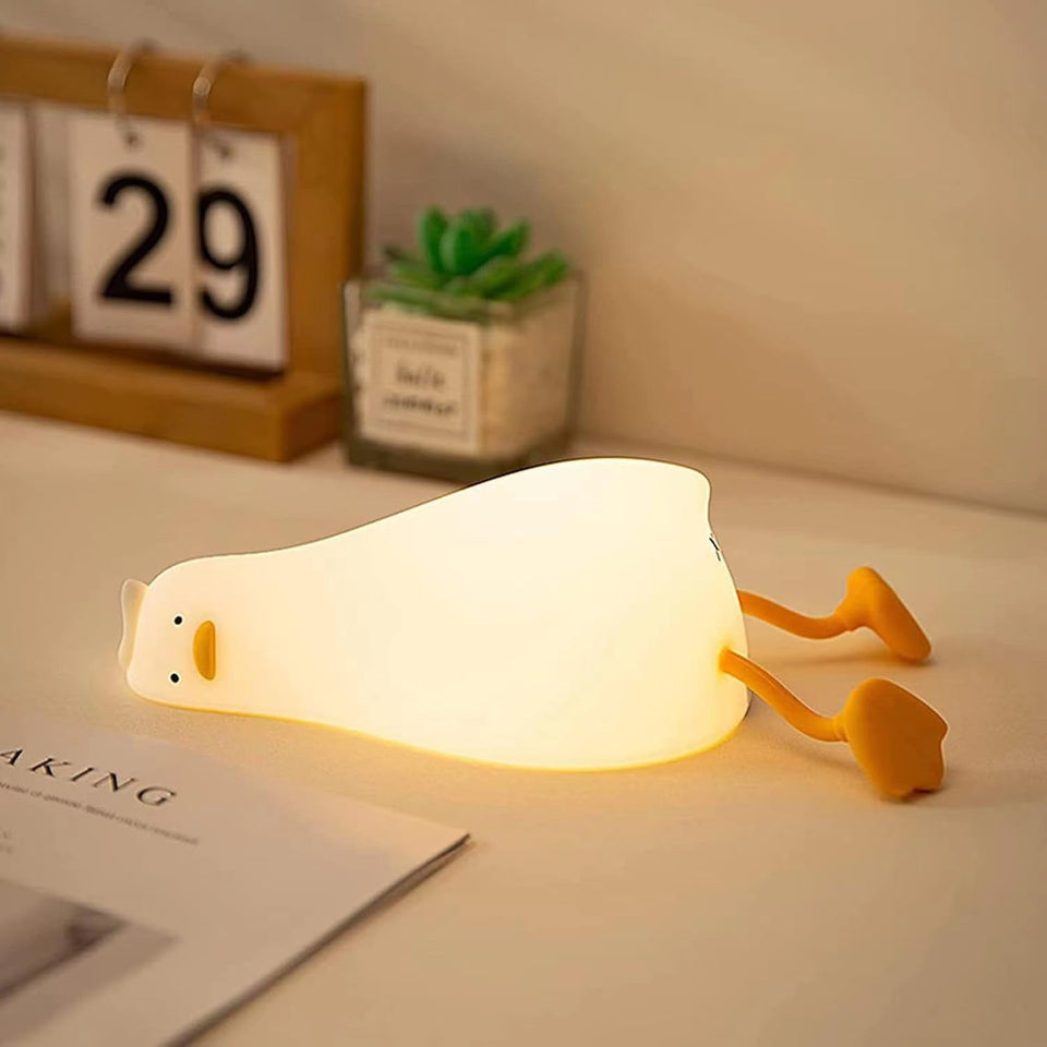 ATCTBOGFS duck night light on bedside table provides warm, cozy illumination