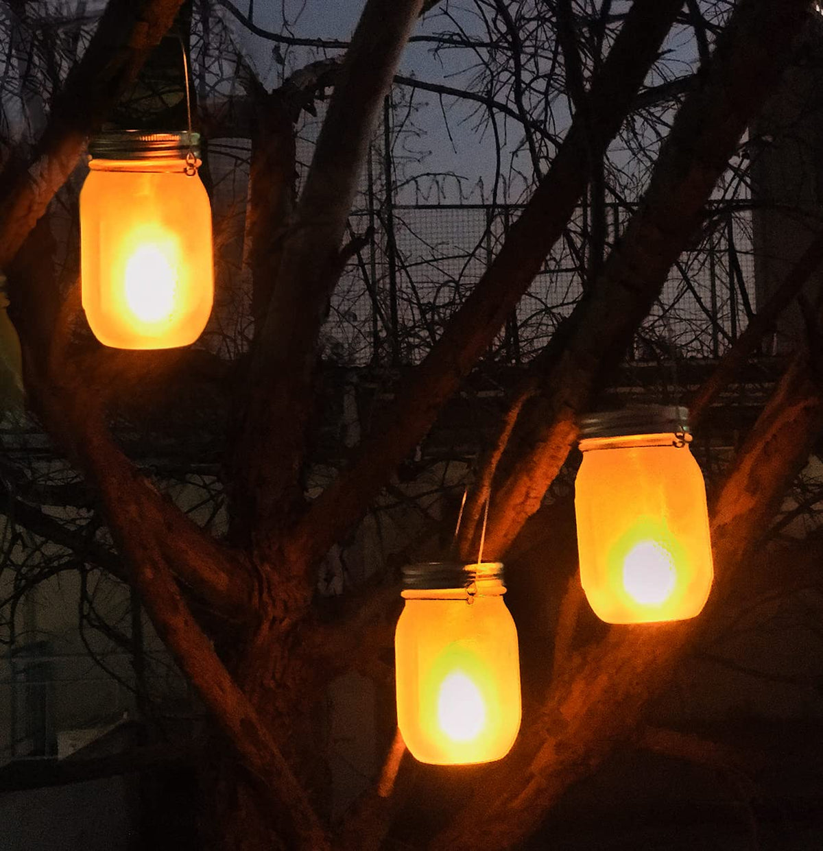 Aubasic mason jar lanterns with dancing flame at dusk for cozy evenings