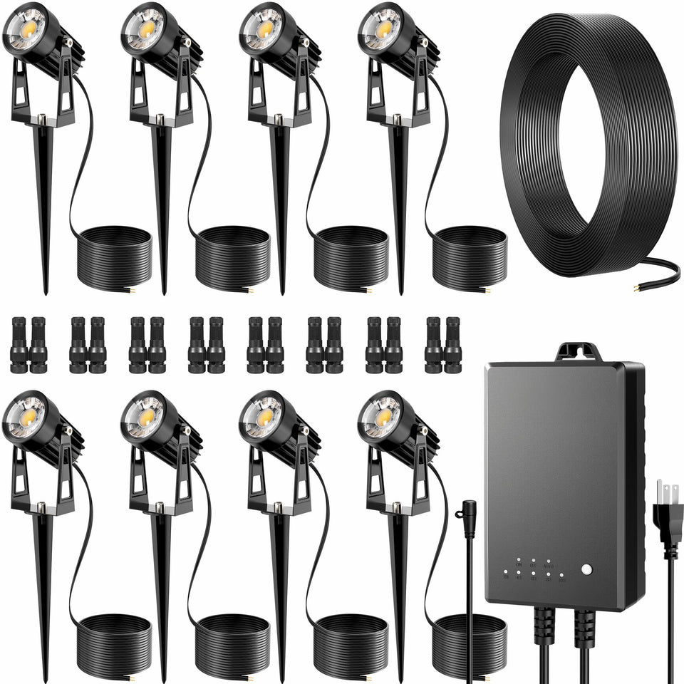 AUDERWIN all-in-one outdoor low voltage spotlights illuminate the yard with a warm 3000K glow.