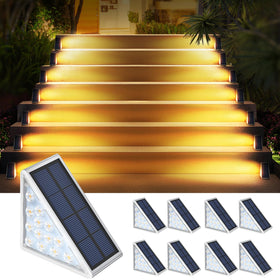 AUDLES 8PK solar step lights on stairs provide safe, warm illumination for evenings.