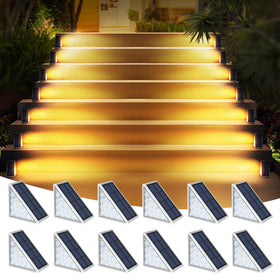 AUDLES LED solar step light top view provides warm glow along a stairway