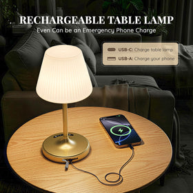 Audles weighted base lamp in gold for stable tabletop placement