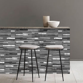 AULIGET wood-effect PVC tiles are easy to cut for precise outlet and corner fits.