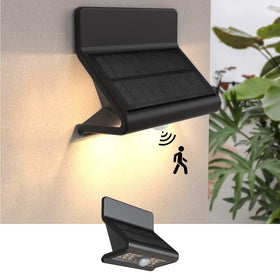 AURAXY solar motion light with front door lens delivers even outdoor illumination.