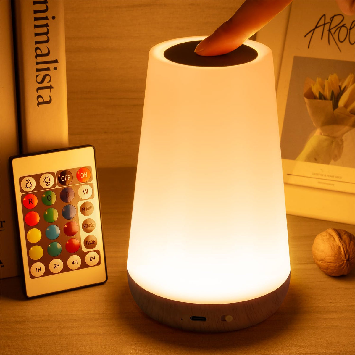Auxmir rechargeable LED night light with 360° touch on top panel for easy control.
