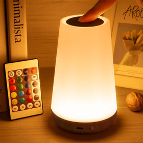 Auxmir rechargeable LED night light with 360° touch on top panel for easy control.
