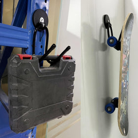 AUXPhome outdoor storage hook secures tools on a shed wall.