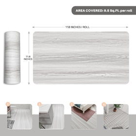 auxua roll-up design floor tiles laid out in a bright living room setting